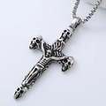 Macro view of a Gothic skull cross pendant in retro silver stainless steel for men - Skull Cross Style