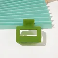 Detailed view of square hollow green hair claw clip on mint green paper backdrop - A190 Small Square - Fruit Green