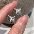 Elegant sterling silver four-pointed star stud earrings with brilliant marquise pavé stones - Ear Buckle / Silver