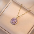 Elegant gold necklace with revolving purple zircon pendant and matching earrings - Purple Flower Necklace (X0061) / Gold