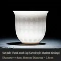 White suet jade porcelain teacup with 100 blessings relief engraving and 180ml capacity - Flared Cup [100 Blessings - Engraved]