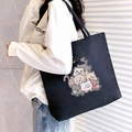 Large black canvas tote bag featuring cute cartoon cat illustrations for daily commute - Black Cute Cat Family