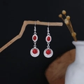 Bohemian silver drop earrings with red turquoise beads hanging on a rustic wooden branch - Silver Red (E6129-1)