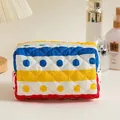 Quilted makeup bag with colorful stripes and polka dots pattern for travel storage - Colorful Stripes and Dots