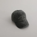 Close-up of vintage charcoal grey washed cotton baseball cap with American pioneers embroidery - 54cm (3-8 Years) / Dark Gray