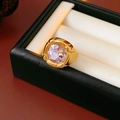 Close-up of vintage gold ring with square-cut pink gemstone in premium jewelry box - Gold-Pink