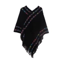 Detail view of ethnic style black knit poncho featuring colorful geometric embroidery and fringe - Black
