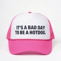 Pink and white Y2K trucker hat with It's a Bad Day to be a Hotdog slogan print - One Size / Rose Red