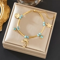 Bracciale dorato con ciondoli marini, perline turchesi e pendenti a forma di delfino - Tema Marino Ciondolo Delfino Tartaruga (B1467)