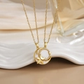 Detail of gold star and moon pendant with pavé cubic zirconia on a delicate chain - Gold Star Moon Zirconia Necklace XL0283