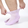 Light purple diabetic socks featuring high-stretch ribbed cuffs and non-slip dotted soles - Purple