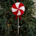 Red and white striped lollipop Christmas ornament with glitter and a velvet bow - Candy