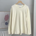 Primer plano de la etiqueta talla L en una camiseta de algodón amarillo de manga larga - M / Tops / Blanco Roto