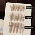 Uñas postizas de purpurina champán con perlas en formas de ataúd, ovaladas y stiletto - Grande (L) / Forma Stiletto (W246)