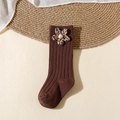Detail of brown cotton knit baby socks with floral fabric accents and pearl embellishments - Xs 0-1 / Coffee