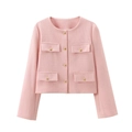 Dettaglio della giacca in tweed rosa con tessuto strutturato e bottoni dorati eleganti - Rosa