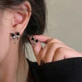 Silver bowknot earrings with black enamel and star charms on an S925 silver needle post - Bowknot Black Rhinestone