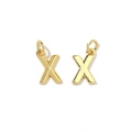 Detailed view of two 18K gold plated copper Zirconia letter X charms for jewelry making - Letter X