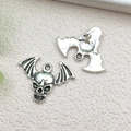 Retro silver alloy skeleton bat charm for DIY jewelry making with detailed metal texture - Winged Skull 23.7x17mm