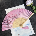 Pink cherry blossom folding fan with wooden ribs and a silk tassel for Hanfu dance - Pleasant Flower Rhythm - Pink