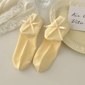 Sweet pale yellow ankle socks with silk bow accent and vertical ribbed knit texture - One Size / Milk Yellow