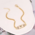 Detail of gold star and rainbow heart bracelet with zircons on a white stone background - 3D Heart Combination (2#)