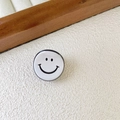 Mini acetate hair claw clip featuring a cute white smiley face for bangs and styling - White