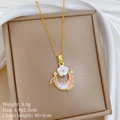 Detail of gold moon and white flower pendant with CZ crystals on titanium steel chain - Pink Moon White Flower Style (A524)