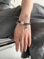 Bracciale a stella Y2K con cordino in pelle nera e doppia catena in metallo argentato - Bracciale con Stella d'Argento