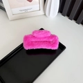 Pink plush rectangular hair claw clip on a minimalist display tray for winter styling - Large Rose Red (approx. 12cm)