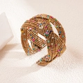 Macro detail of Bohemian multilayer woven beaded bracelet with colorful seed beads - Colorful