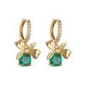Eleganti orecchini a fiocco dorati con cristalli verdi quadrati su sfondo bianco - Orecchini / Oro Verde Zircone