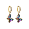 Macro detail of gold-plated crystal butterfly earrings with gradient stones and pavé crystals - Gradient