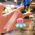 Pink and blue octopus glowing keychain with Blossom For You silicone strap and metal clip - Glowing Octopus-Pink Blue