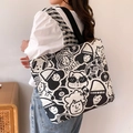 Canvas tote bag in black and white featuring street art graffiti and music dog patterns - Music Carnival