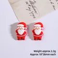 Mini resin Santa Claus figurines for DIY crafts and holiday decor set of two pieces - Raising Hands Santa