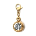 Macro detail of 6mm gold pendant with clear round gemstone and lobster clasp - [Lobster Clasp] April White