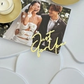 Golden acrylic 'Just for You' cake topper on a wedding themed decorative card background - Just Love You