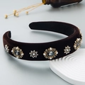Baroque style velvet headband with vintage pearls and crystals on a decorative tray - Brown