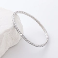 Pulsera tenis clásica de plata con circonitas redondas sobre una base de piedra blanca - Color Acero
