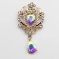 Vintage golden crystal brooch featuring iridescent teardrop rhinestones and crown style - AB Color