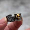 Gothic style stainless steel biker ring featuring a gold skull shield and wing patterns - US 7 / Gold and Silver Two-tone