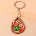Weihnachtlicher Schlüsselanhänger aus Holz in Tropfenform mit Fallschirm-Motiv - Fallschirm Geschenkbox