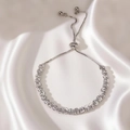 Detail of silver beaded bracelet with textured spiral finish and adjustable bolo clasp - Silver