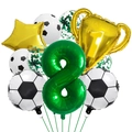 Detail of football party kit with green number 8, golden trophy and soccer balloons - Soccer Set Number 8