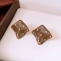 Close-up of brown enamel square stud earrings with white polka dots and gold trim - Silver Earring Post - Coffee - Square