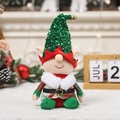 Christmas faceless elf doll with green sequin hat and red plaid outfit on festive desk - Green Hat Elf Style