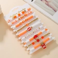 Orange and white rugby beaded bracelet set with Game Day charms and 00 jersey pendant - SY0757-1 Orange White Gold 10pcs Set