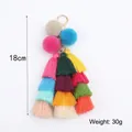 Bunter mehrlagiger Quasten-Schlüsselanhänger mit Plüschkugeln und Goldclip, 18 cm - Bunt