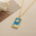 Golden tarot sun pendant necklace with blue enamel and sparkling cubic zirconia stones - Sun - Blue